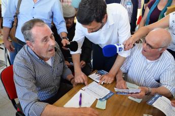 João Ferreira entre pedreiros